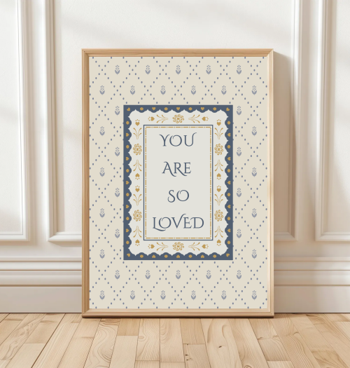 You Are So Loved print with patterned background and double border – available in blue or pink – traditional nursery wall art.